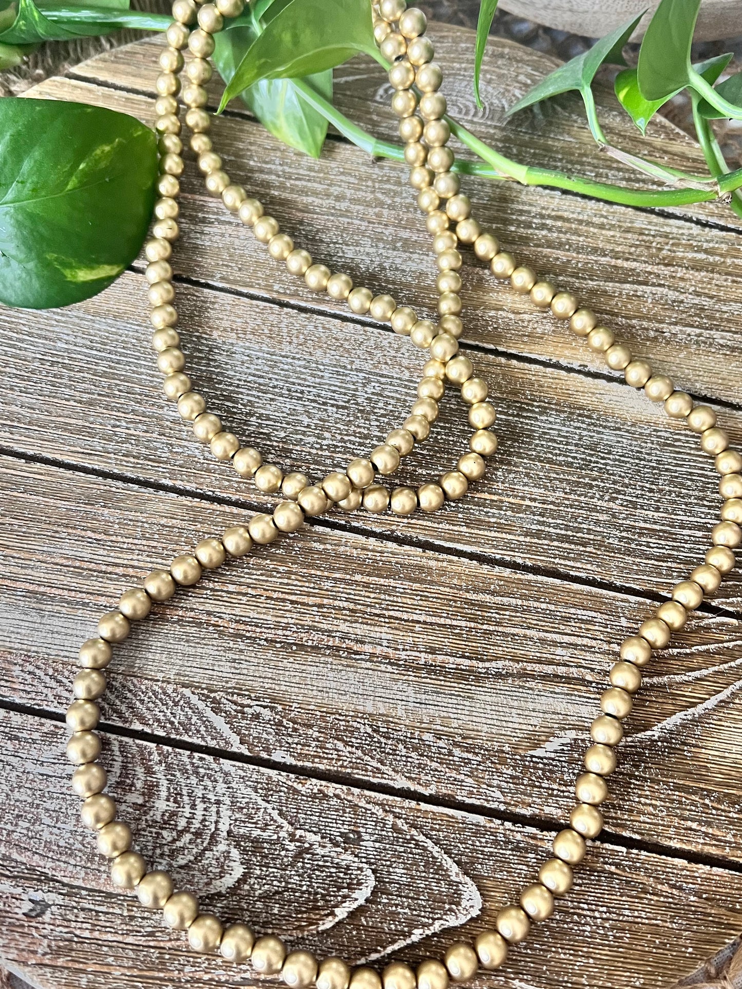Gold long necklace
