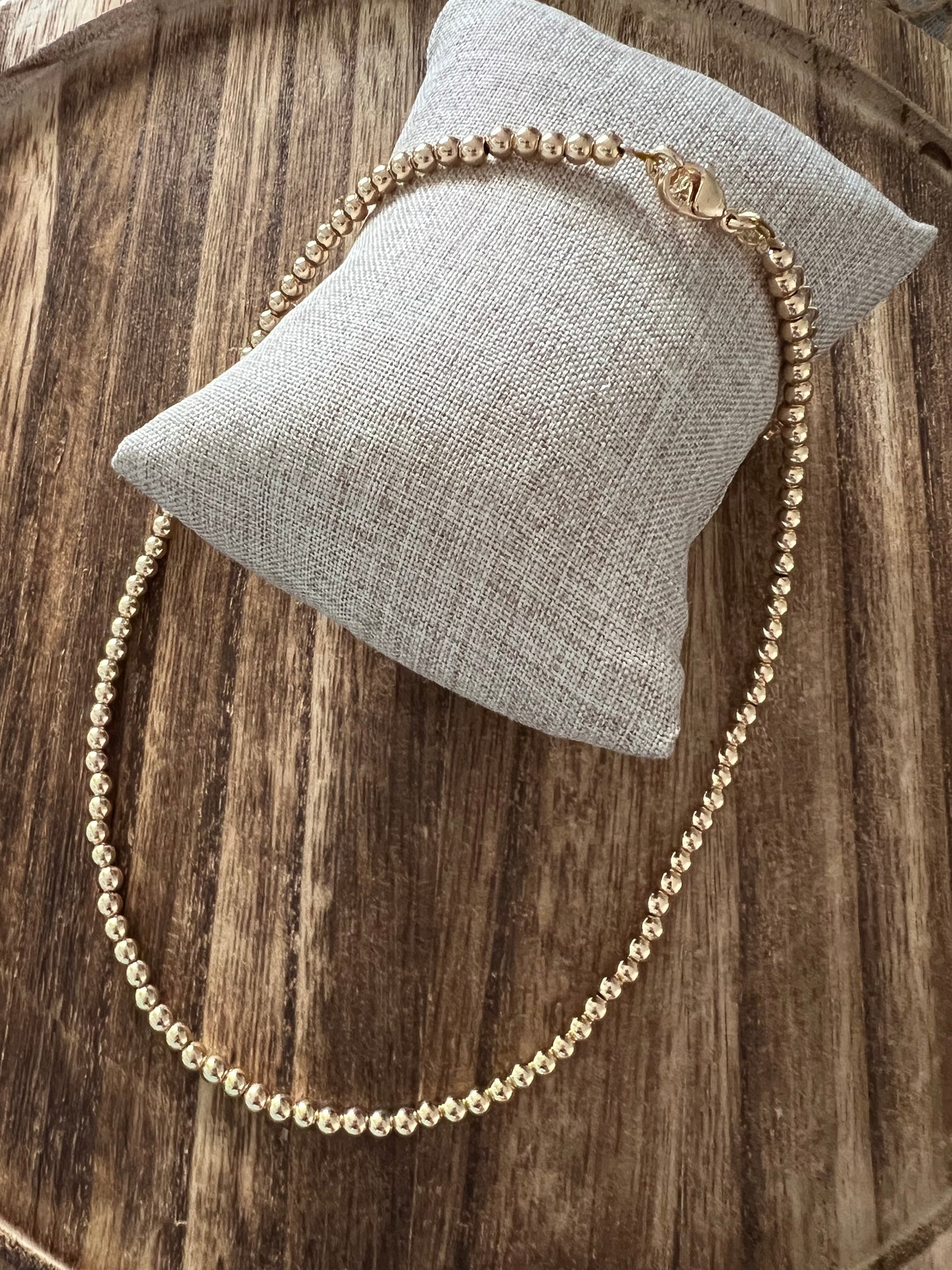 Gold beaded necklace
