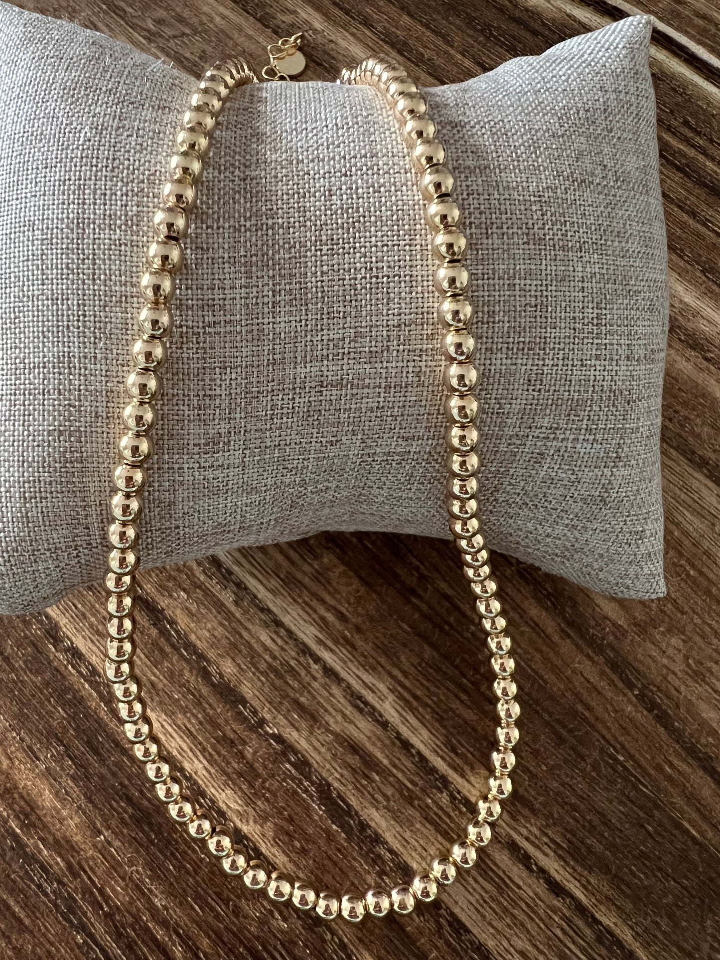 Gold beaded necklace