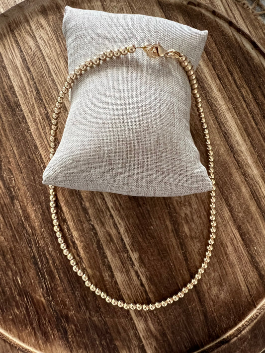 Gold beaded necklace